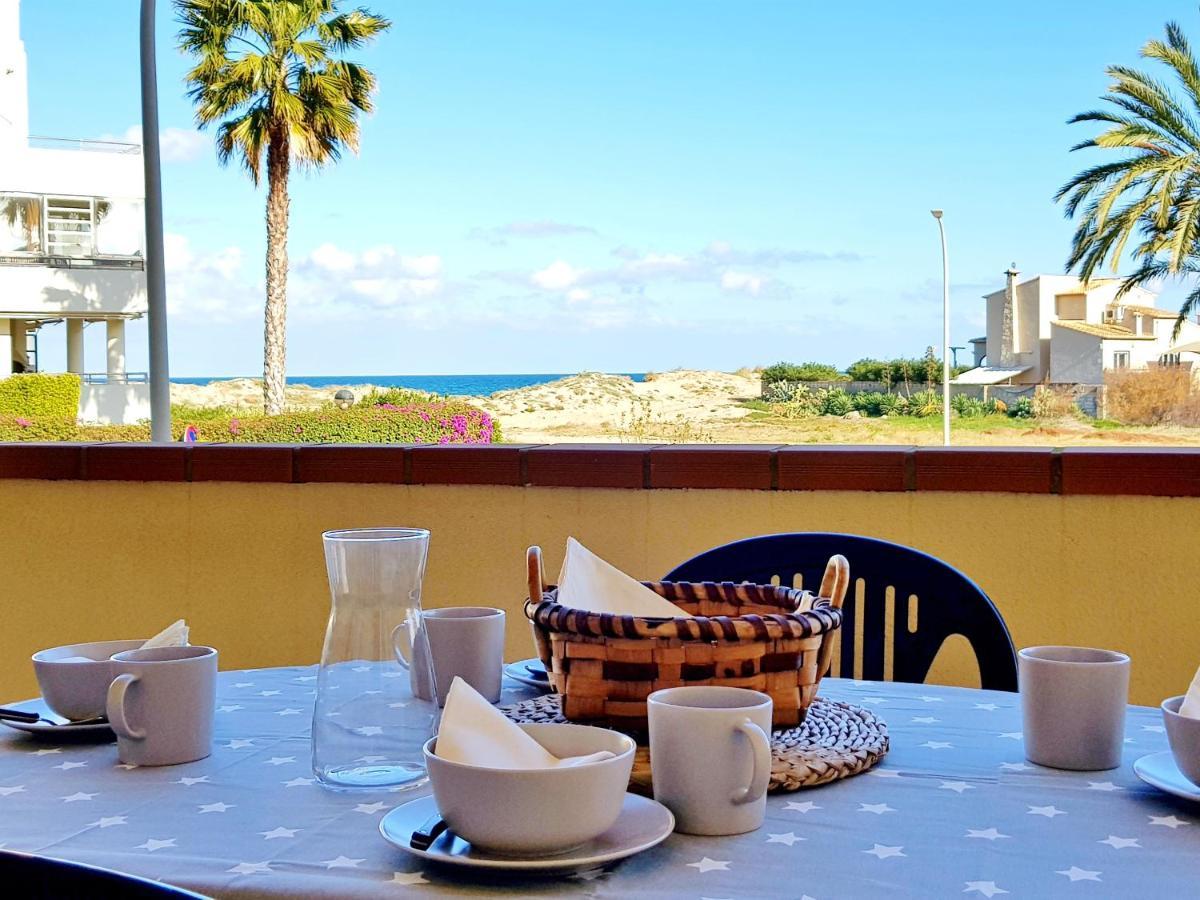 Apartamento con piscina frente al mar. Oliva Nova Esterno foto