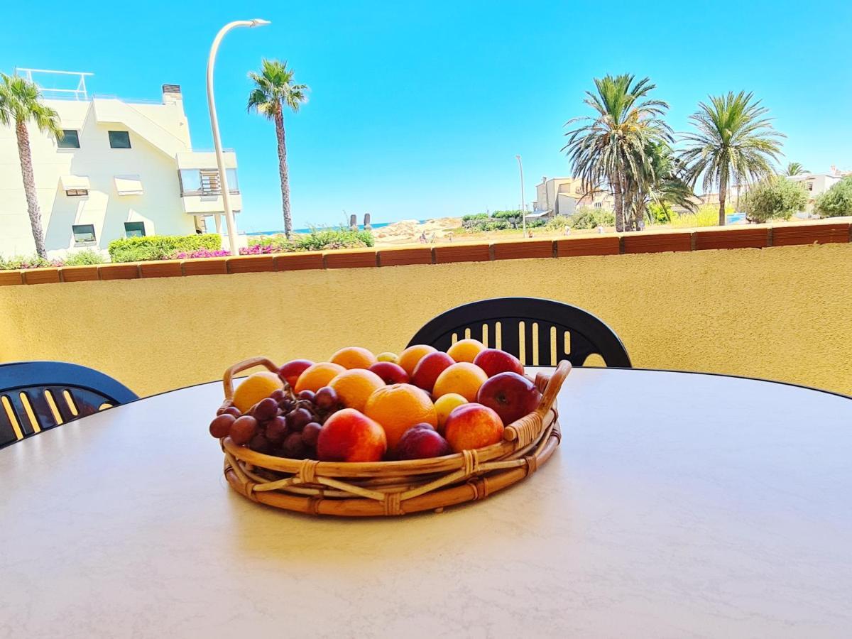 Apartamento con piscina frente al mar. Oliva Nova Esterno foto