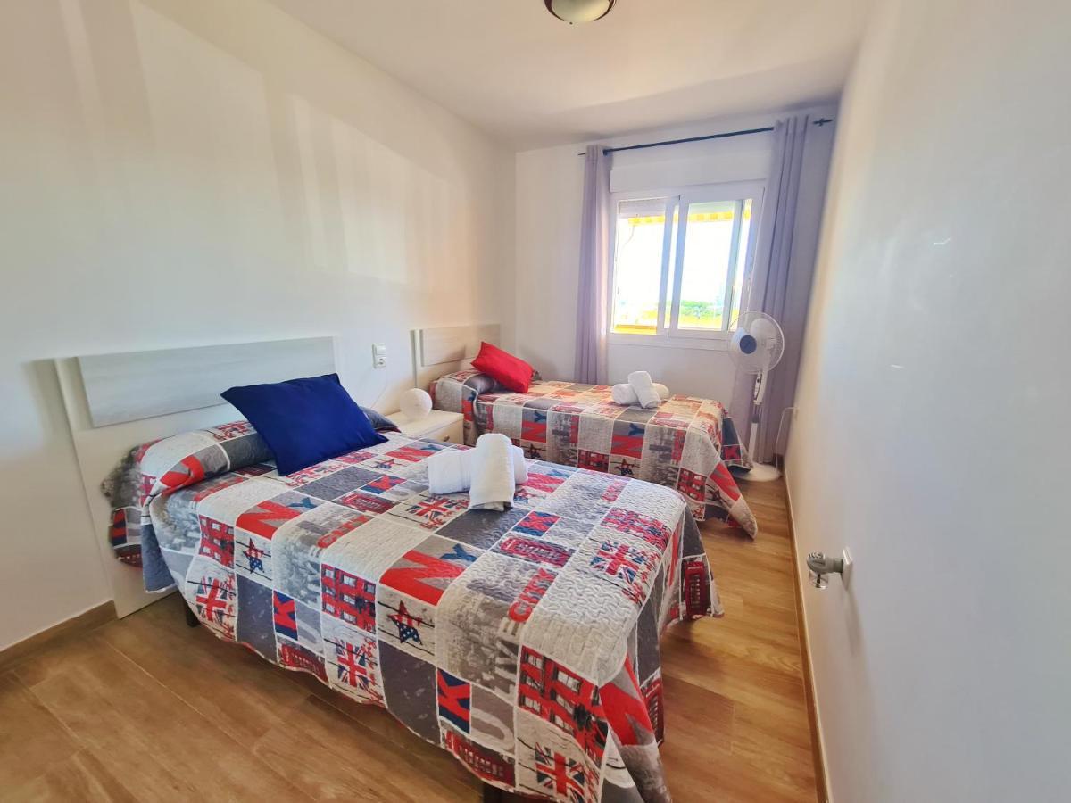 Apartamento con piscina frente al mar. Oliva Nova Esterno foto